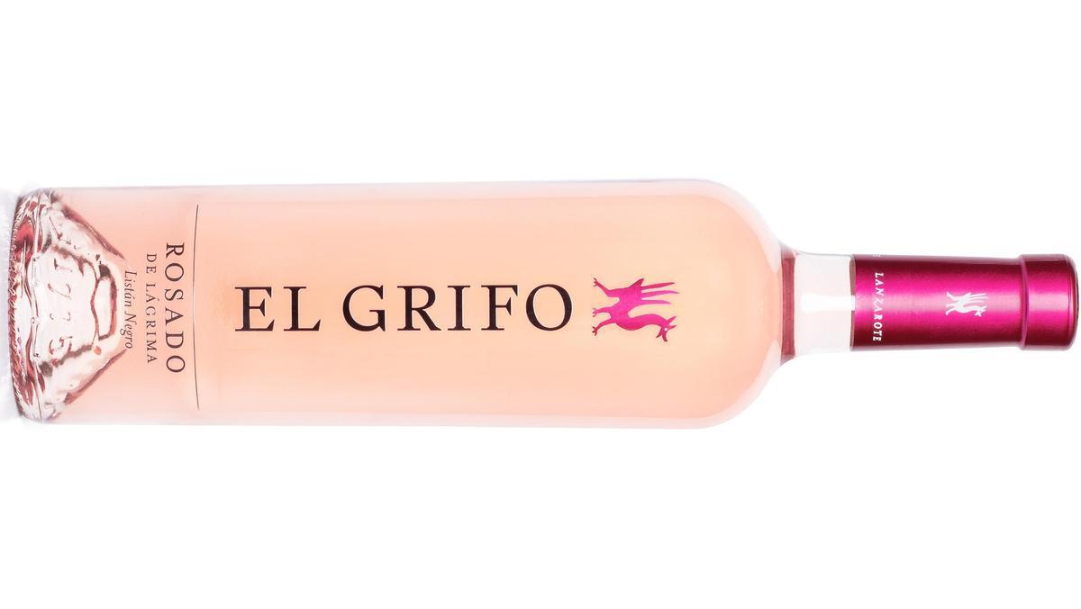 Botella de Corimbo Rosado Reserva 2023 sobre fondo de viñedo en la Ribera del Duero